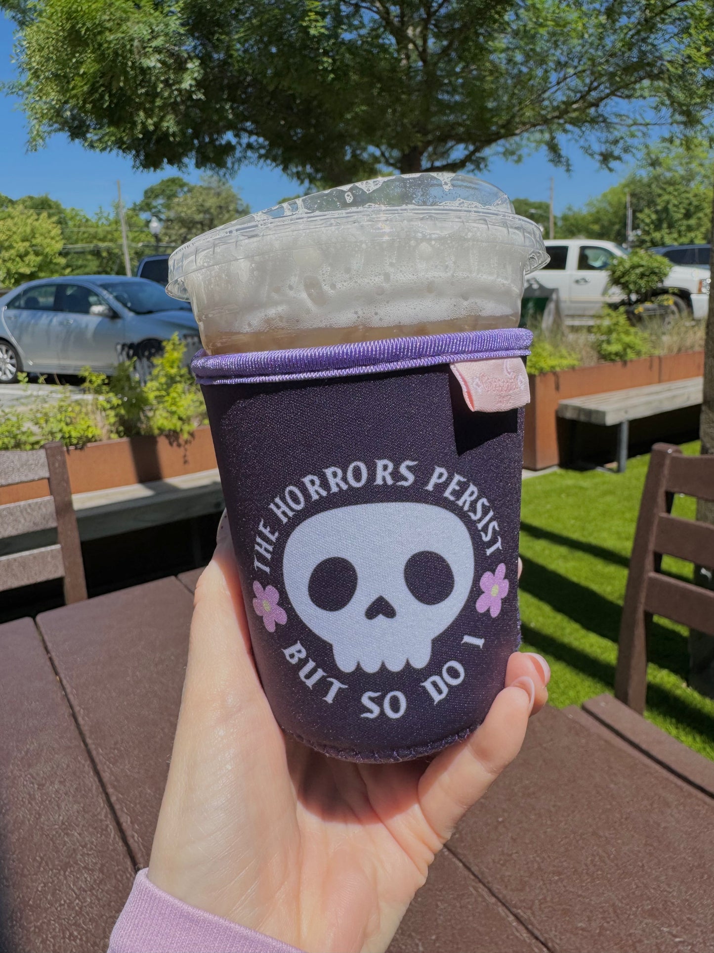 The Horrors Persist But So Do I Iced Coffee Sleeve
