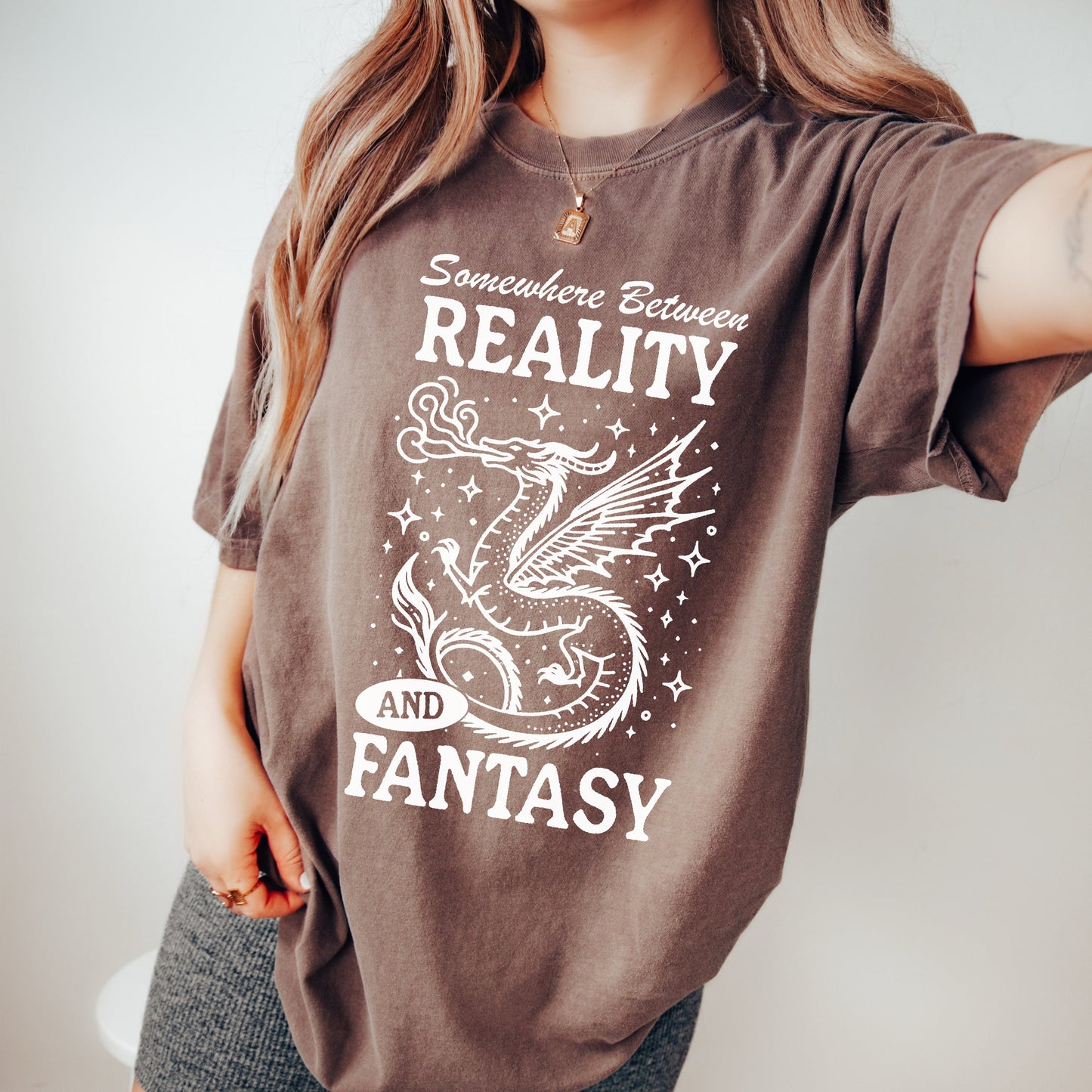 Somewhere between Fantasy and Reality Tshirt | Bookish Reader Shirt | Trendy Whimsical Bookworm Gift | Dragons and Fairys | Smut and Romance